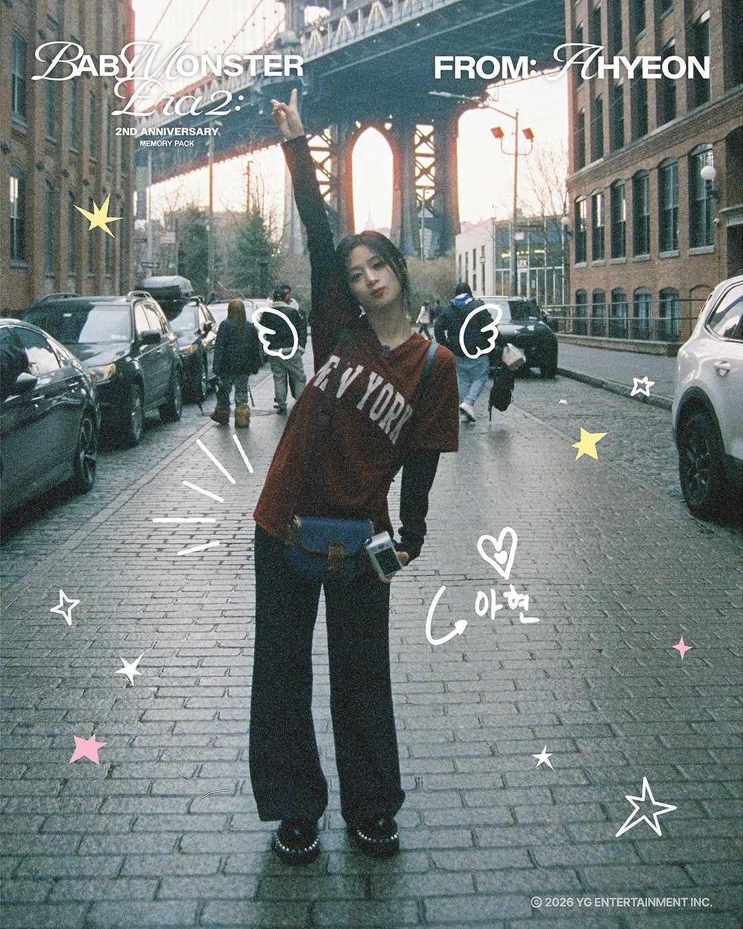 BABYMONSTER Ahyeon in a preview photo for the ERA II 2nd Anniversary Memory Pack, featuring a floral and butterfly motif.