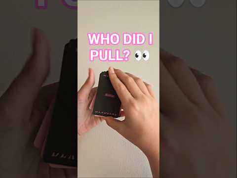 BLACKPINK photo cards being revealed by a K-pop collector