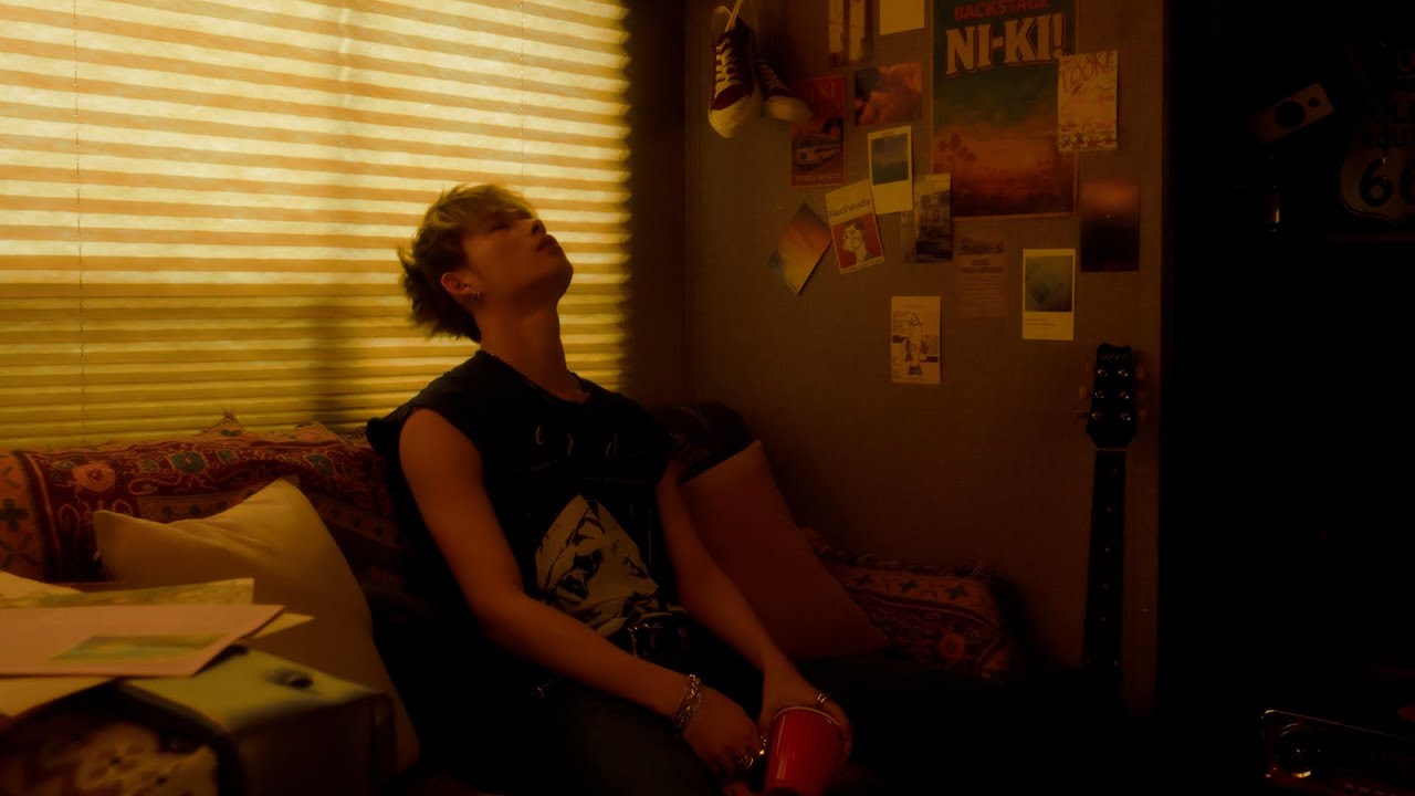 ENHYPEN NI-KI Cover Teaser thumbnail showing NI-KI in a dark setting, looking intently at the camera.