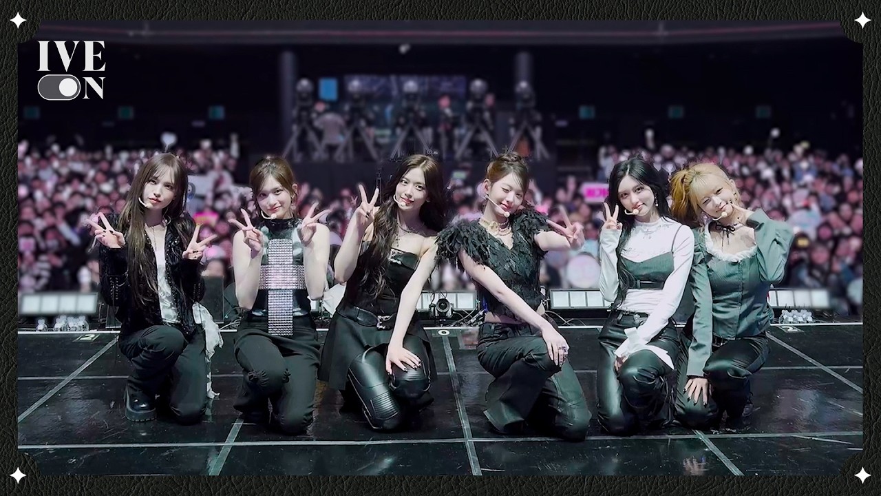 IVE members on stage during their 'REVIVE+' showcase, captured in a behind-the-scenes video thumbnail.