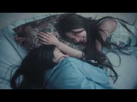 Screenshot of a K-pop playlist video titled "This Life is a Happy Ending" featuring various K-pop artists and a cute aesthetic.