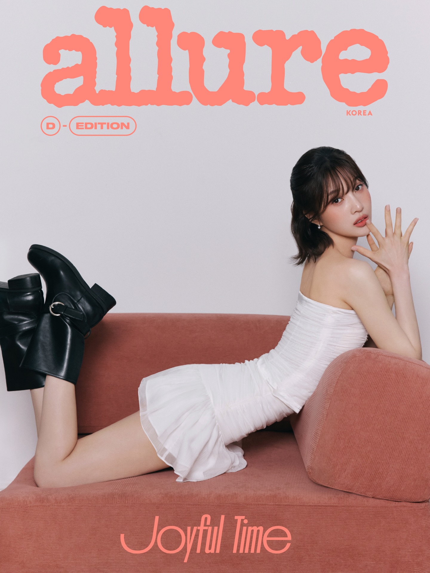 Red Velvet's JOY posing for Allure Korea in a stylish outfit, smiling confidently.