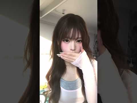 A dynamic still from LE SSERAFlM COVERS' dance cover of 'SPAGHETTI', featuring intense choreography and vibrant energy.