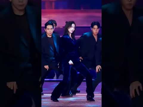 LE SSERAFIM's Kazuha performing a cover of Jungkook's Standing Next to You with intense charisma.