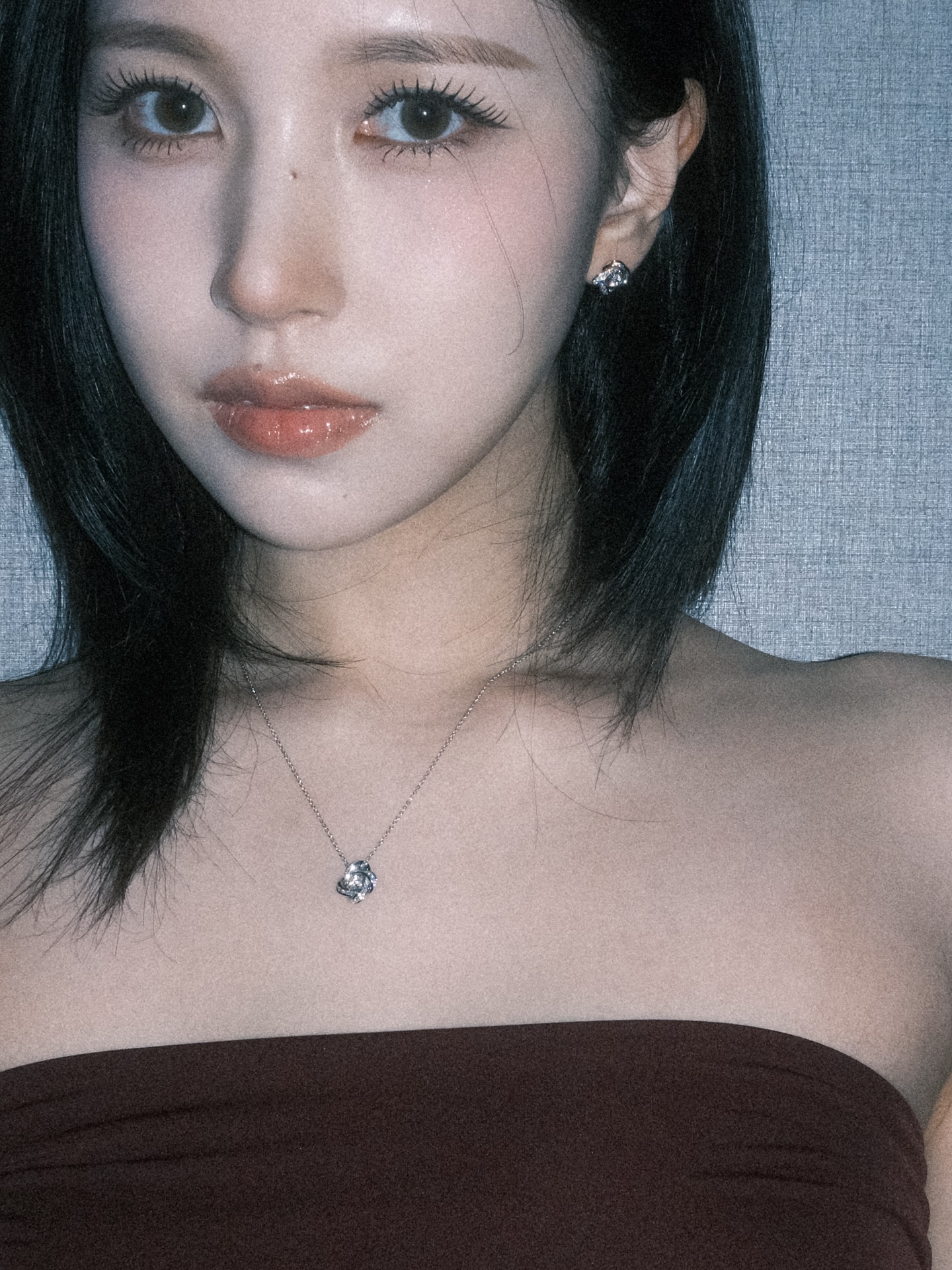 Mina's Instagram post showcasing Boucheron 'Pivoine' collection earrings.