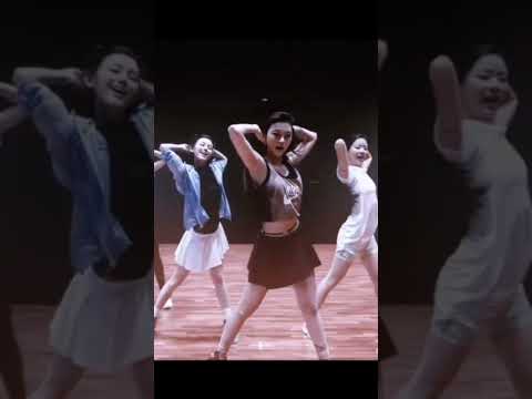 NewJeans Haerin smiling and posing in a colorful outfit with a microphone, from a YouTube fan edit thumbnail.