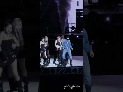 SEVENTEEN members The8, Mingyu, and S.Coups performing on stage in Singapore