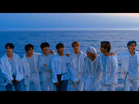 Stray Kids members as seen in 'Endless Sun' line distribution video thumbnail