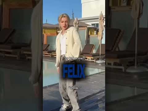 Stray Kids' Felix in a dynamic pose, likely from a performance or photoshoot, conveying his charismatic stage presence.