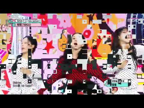 TWICE's Chaeyoung performing on stage, smiling and charismatic