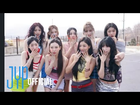 TWICE members in a scene from their 'ONE SPARK' music video, overlaid with 'SEESAW' AI cover text.